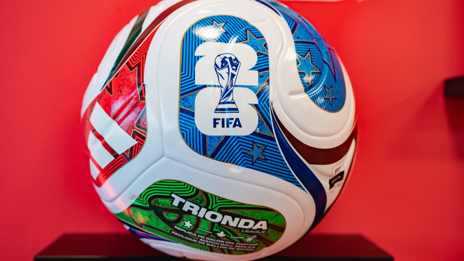 A football featuring the FIFA World Cup Trophy