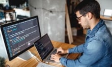 A man learns code on his computer.