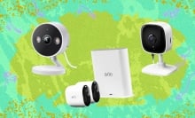 Security cameras on gradient background
