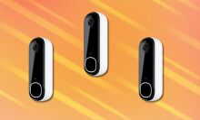 three arlo video doorbells arranged on an orange background with lighter orange streaks