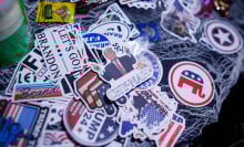 A pile of stickers featuring Trump memes, "Let's Go Brandon" messages, and Republican symbols. 