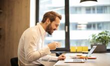 Man looking at laptop