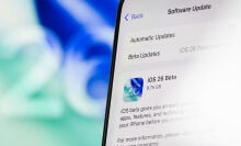 iOS 26 beta download page on an iPhone screen