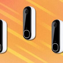 three arlo video doorbells arranged on an orange background with lighter orange streaks