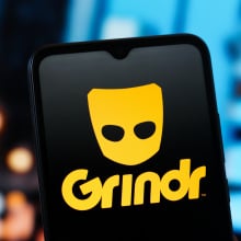 grindr logo on smartphone