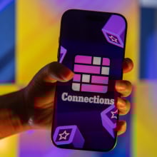 A phone displaying the New York Times game 'Connections.'