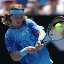 Tennis player Andrey Rublev plays a backhand in the Australian Open