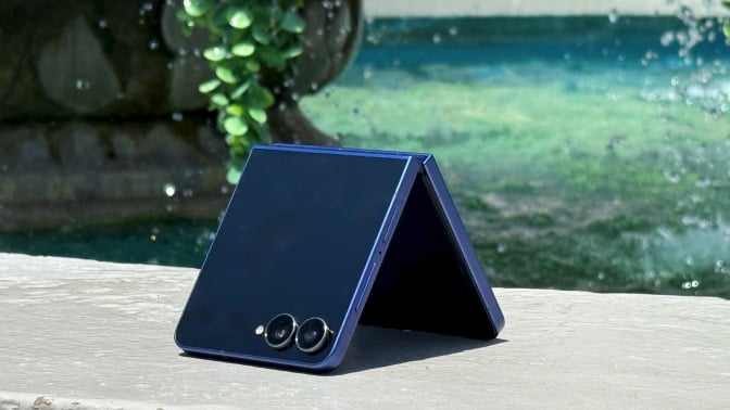 samsung galaxy z fold 7 on the edge of a fountain