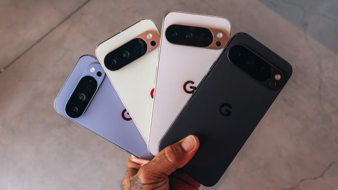 four pixel 10 pro phones fanned out in person's hand