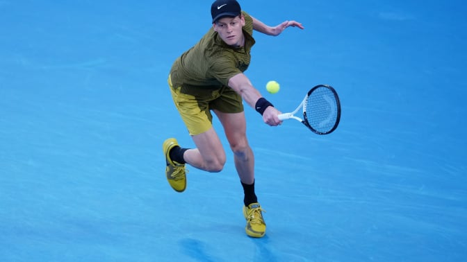 Jannik Sinner of Italy plays a backhand