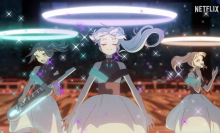 Three animated girls in a band.