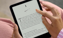 A person using a Kindle 