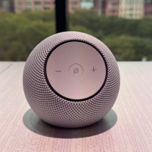 An Amazon Echo Dot Max speaker on a table