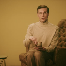 An awkward looking man poses as an AI chatbot that said harmful things to young users. 