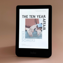 A Kobo Clara Colour on a pale pink background