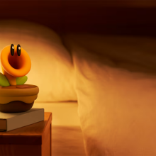 The Nintendo Talking Flower on a bedside table