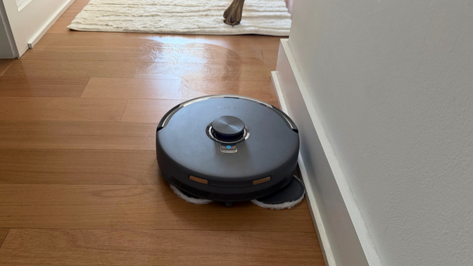 Narwal Freo Z10 Ultra mopping hardwood floor near baseboards